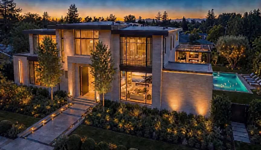 Concept visualization of a warm modern foyer opening into a luxury home at dusk